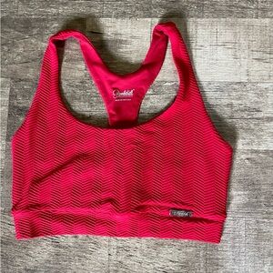 Bombshell Sportswear chevron bra.  Size medium in flame red.